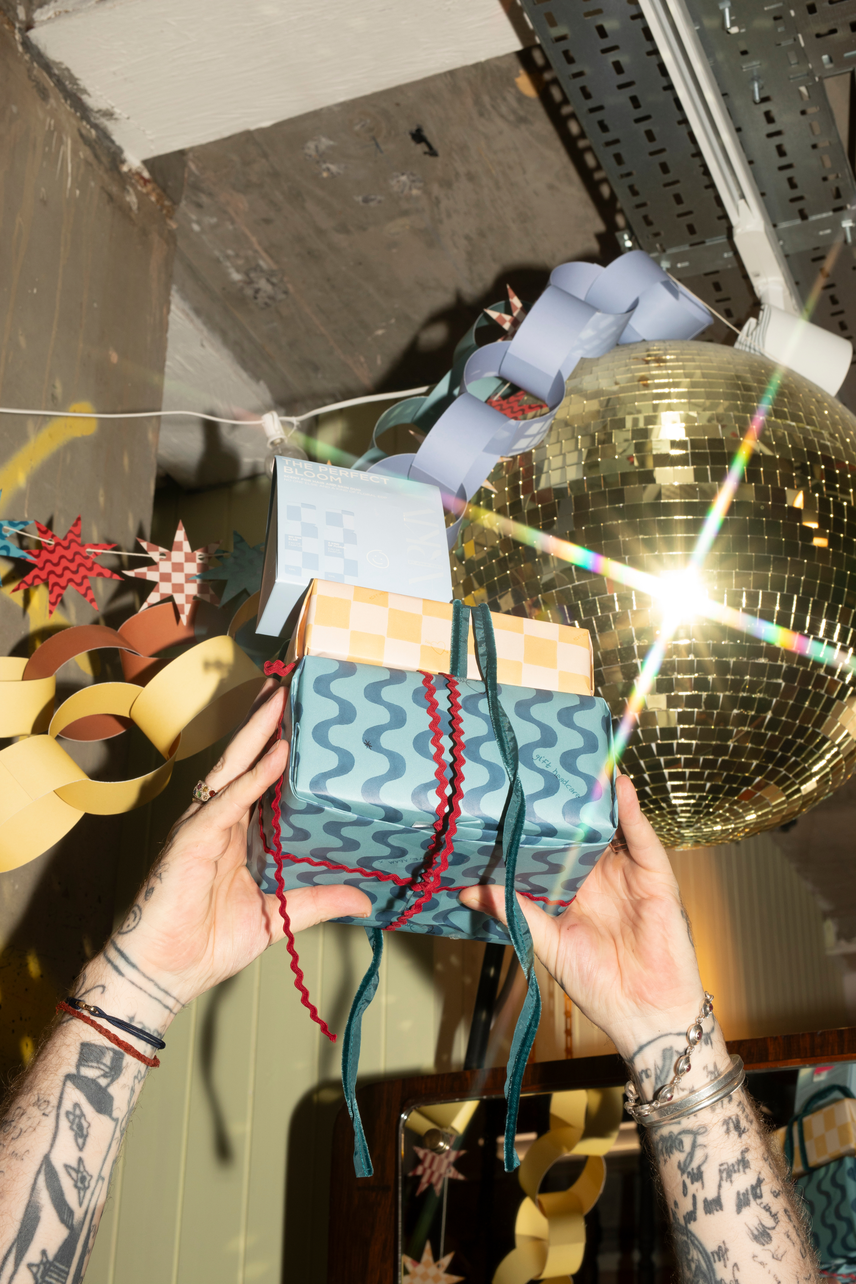 Graphic of a typography specimen showing the alphabet and numerals on top of a dark gray background.