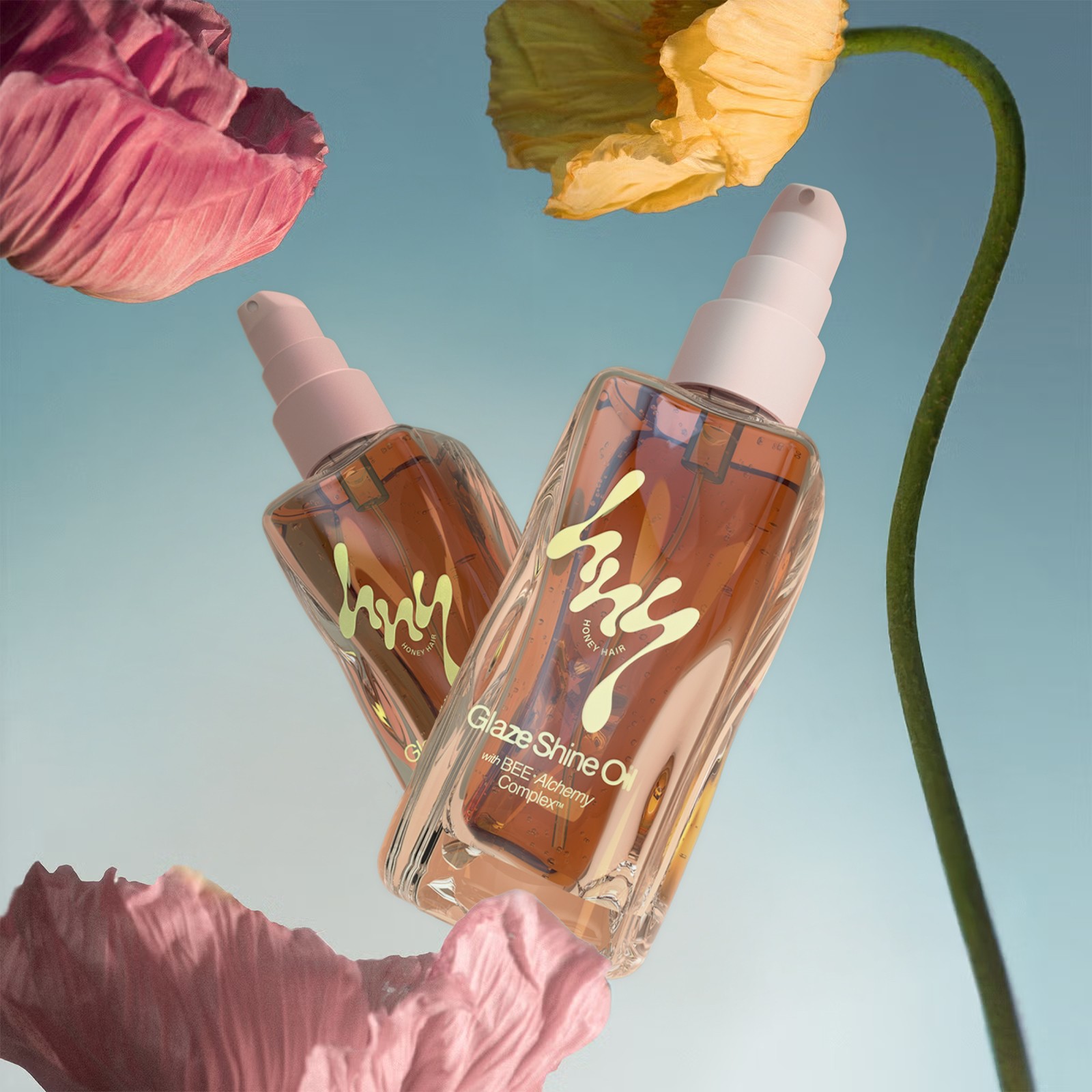 Graphic of a typography specimen showing the alphabet and numerals on top of a dark gray background.