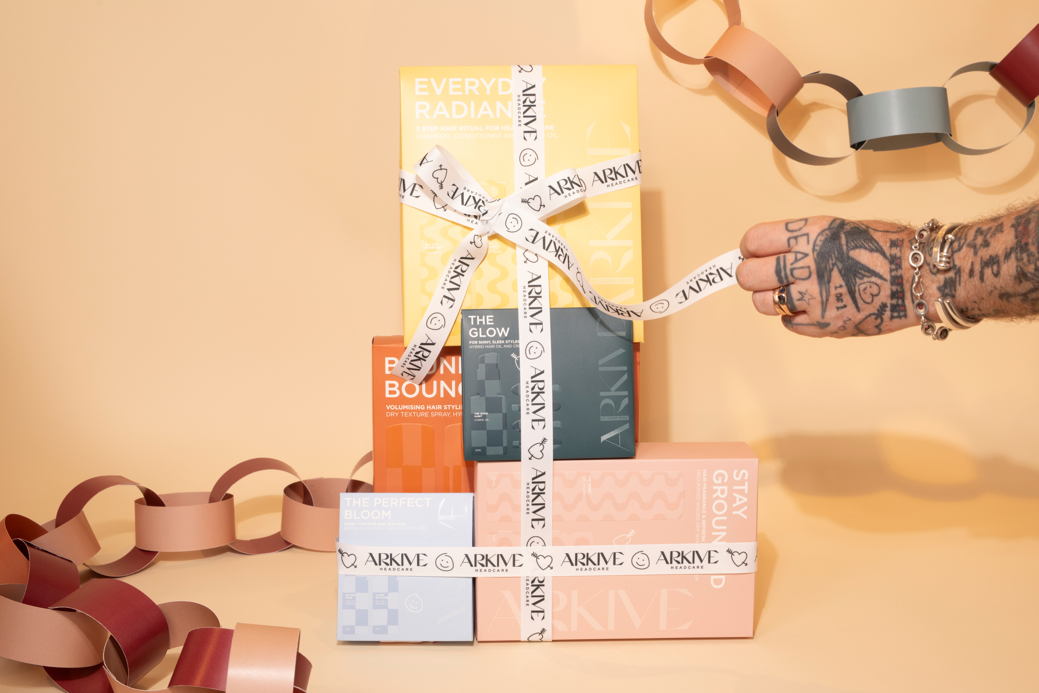 Graphic of a typography specimen showing the alphabet and numerals on top of a dark gray background.