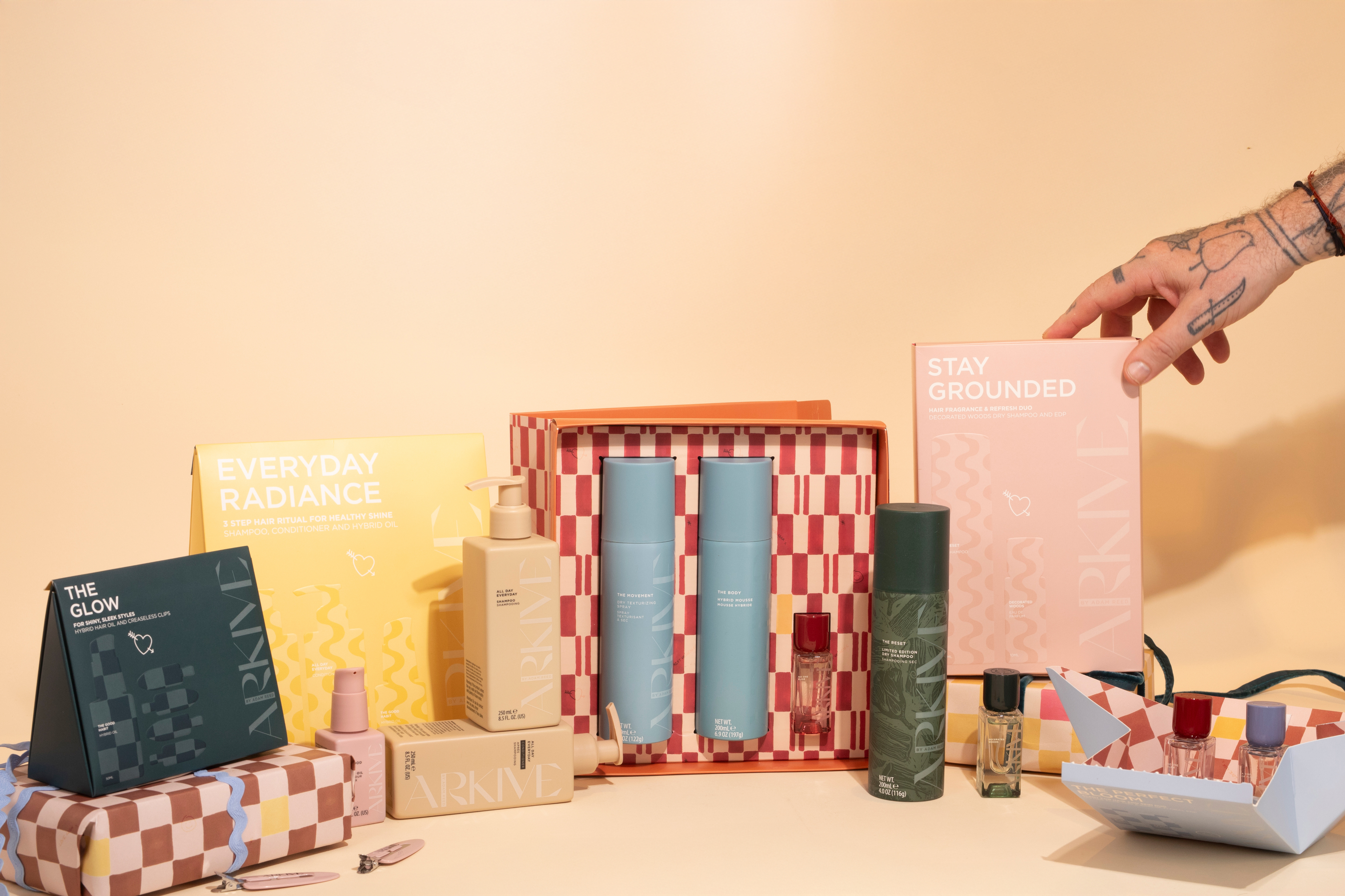 Anders brand wordmark in white placed on top of an image of a modern interior design.